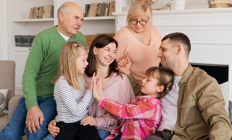 medium shot happy family couch 1